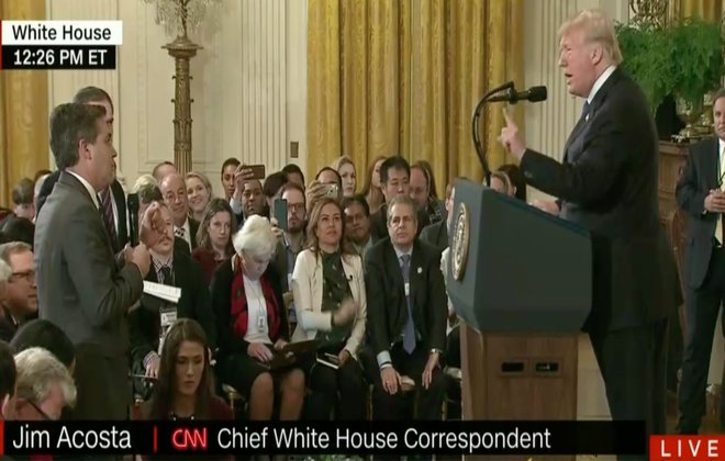 White House bans CNN reporter Jim Acosta after a confrontation with Donald Trump during presser