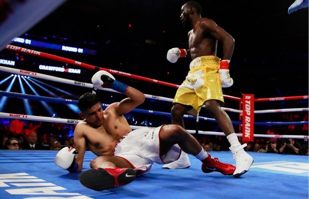 Amir Khan beaten by Terence Crawford after receiving a low blow