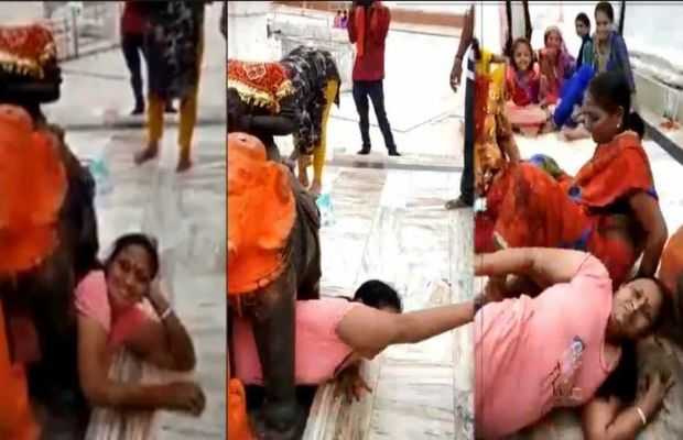 For the love of god; woman gets stuck underneath god’s statue in India