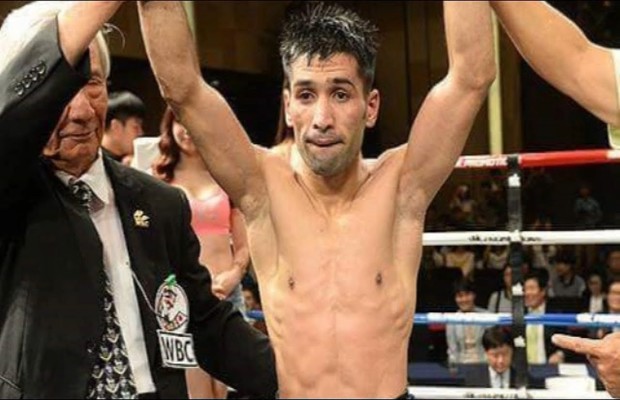 Boxer Mohammad Waseem knocks down his Filipino opponent in just 82 seconds