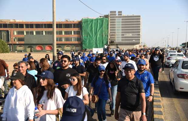 walks at Ilmathon in support of Education