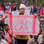 Indians demonstrate against massacre of Delhi Muslims in London