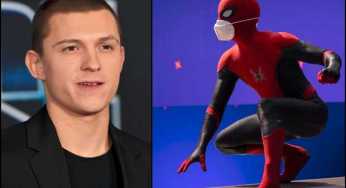 Tom Holland shows off his Spiderman mask, and his real-life, pandemic mask