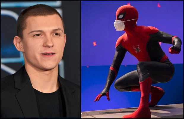 Tom Holland shows off his Spiderman mask, and his real-life, pandemic mask