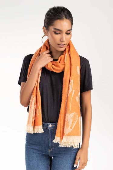 rust scarf with a white motive