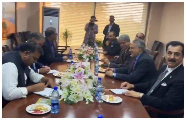 Govt and PTI finally sit together at negotiation table