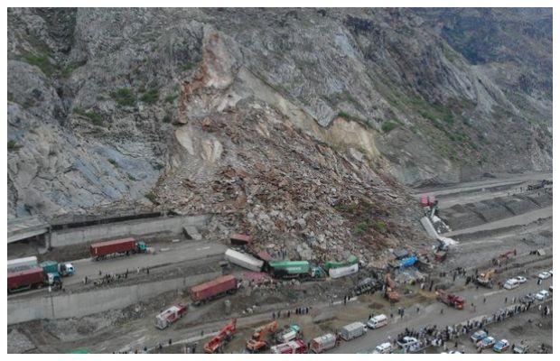 Two killed in a landslide near Torkham border burring over 20 trucks